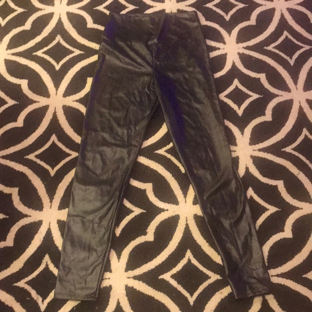 Super stretchy sexy black leggings of a questionable size fit for a rock star